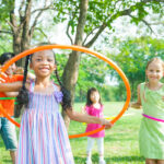 kids-hula-hooping-outside