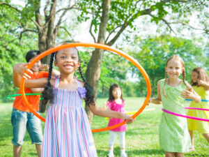 kids-hula-hooping-outside
